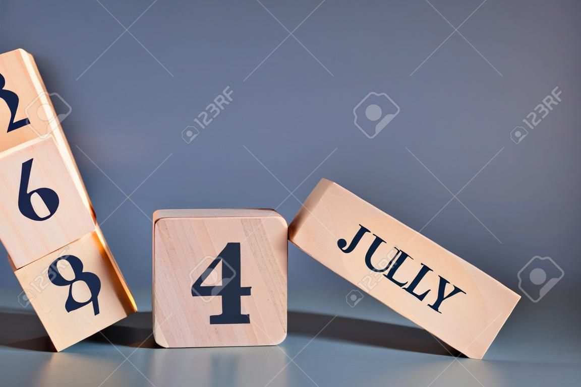 July 4, Cover in the evening time, Date Design with number cube for a background.