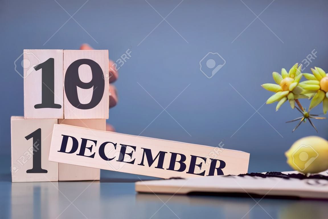 1. Dezember, Cover in der Abendzeit, Datumsdesign mit Zahlenwürfel als Hintergrund.