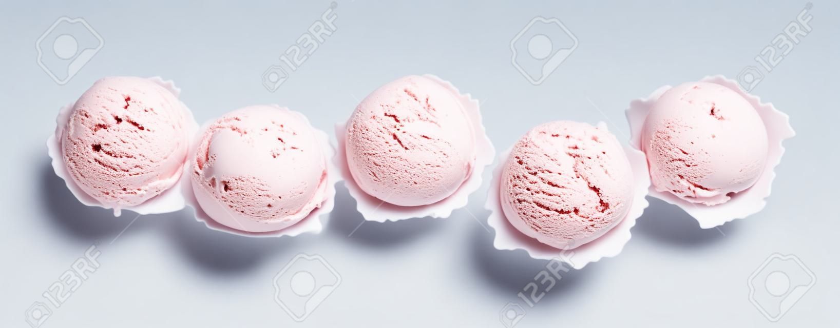 High Angle Still Life View of Five Scoops of Colorful and Refreshingly Cool Ice Cream in front of White Background