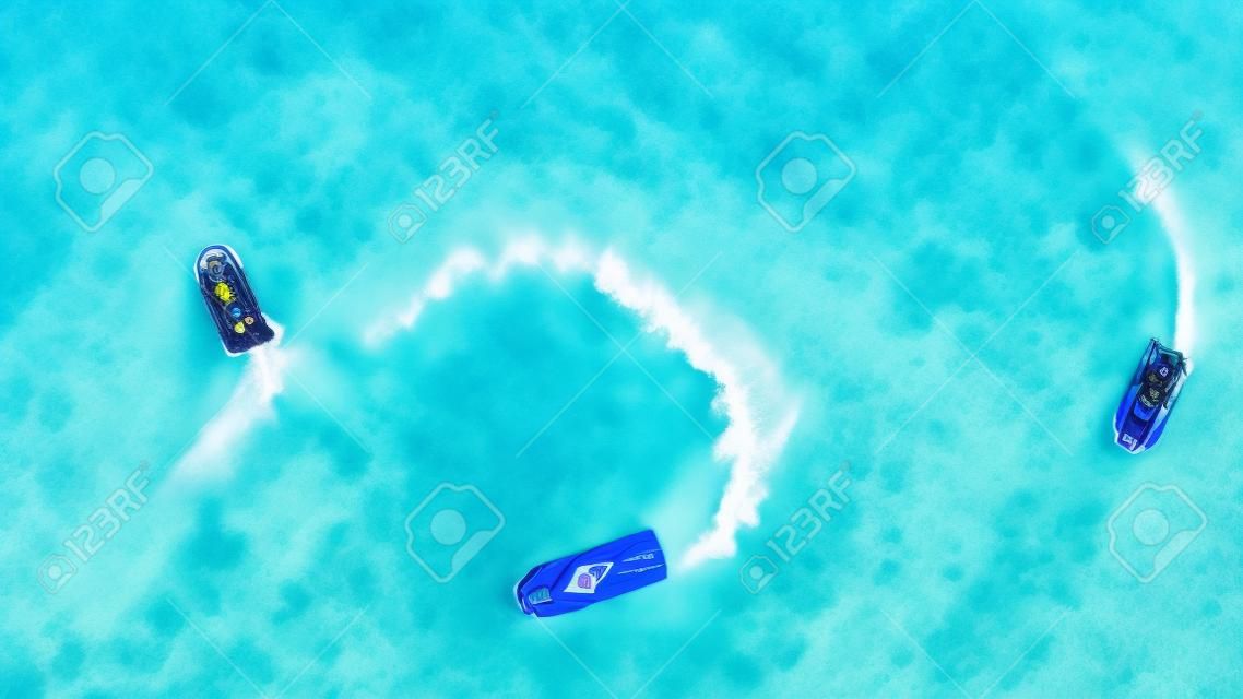 Aerial view of Jet Ski, Tropical Ocean Maldives island summer vacation
