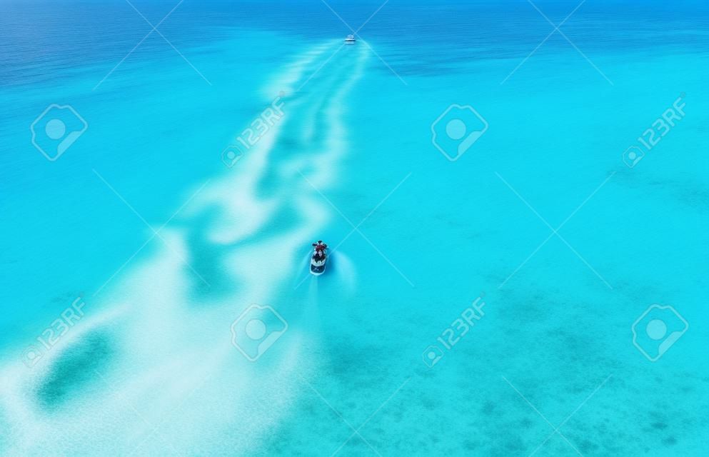 Vista aerea Jet Ski Oceano Indiano Maldive isola viaggio vacanza concetto.