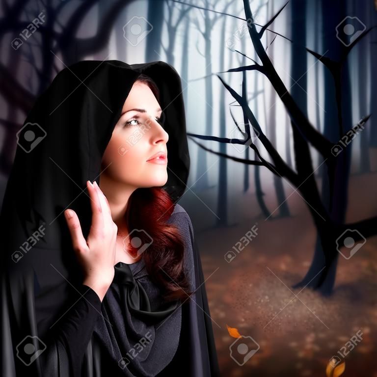 młoda czarownica w lesie