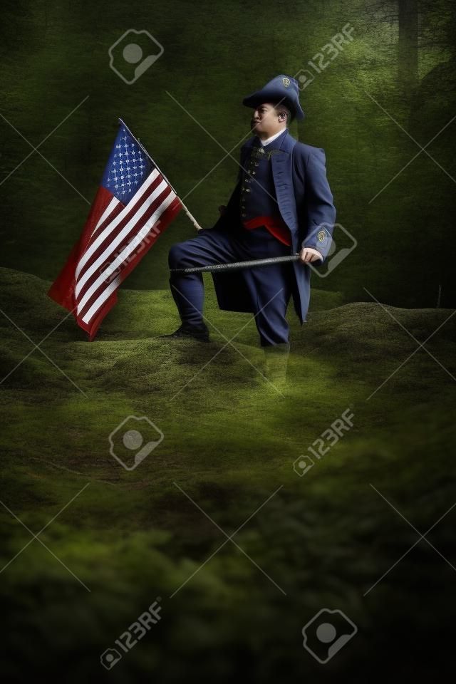 アメリカ独立戦争の兵士の衣装で、旗が森の中でポーズをとる男。米国コンセプト写真合成47月独立記念日