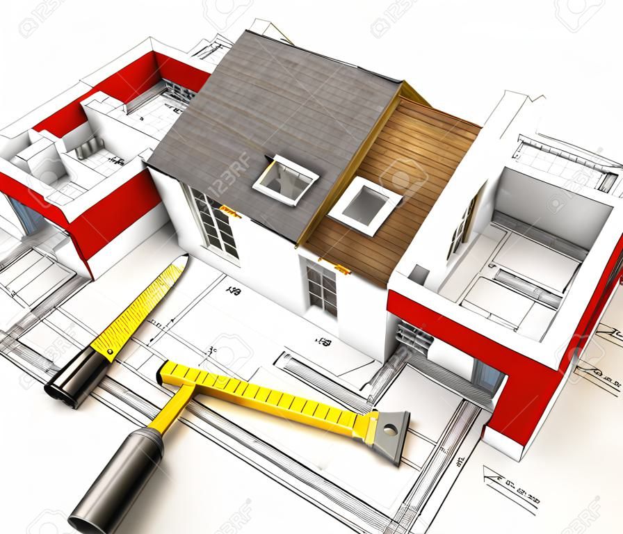 Aerial view of a house under construction, with blueprints and architect work tools
