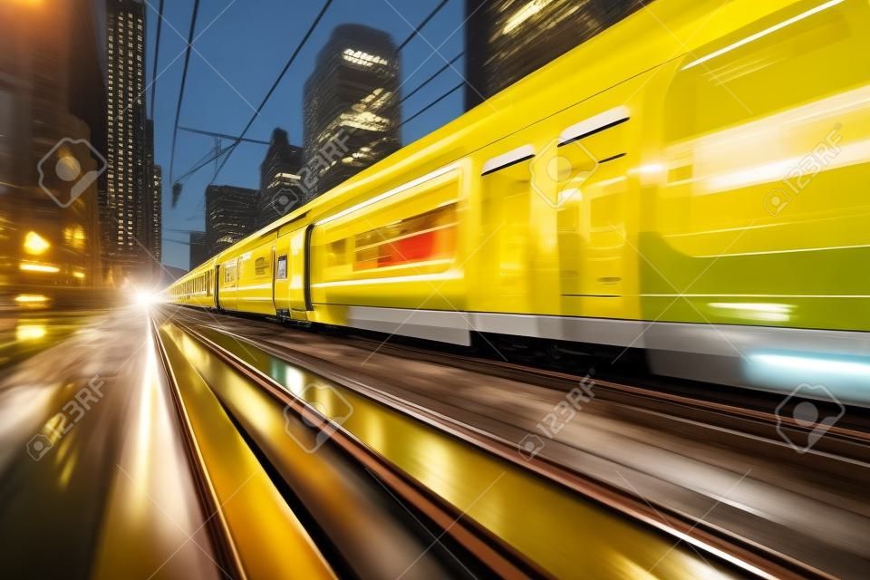 A sleek yellow train speeds along the electric railway, surrounded by the bustling blur of the cityscape, embodying the essence of modern urban transportation