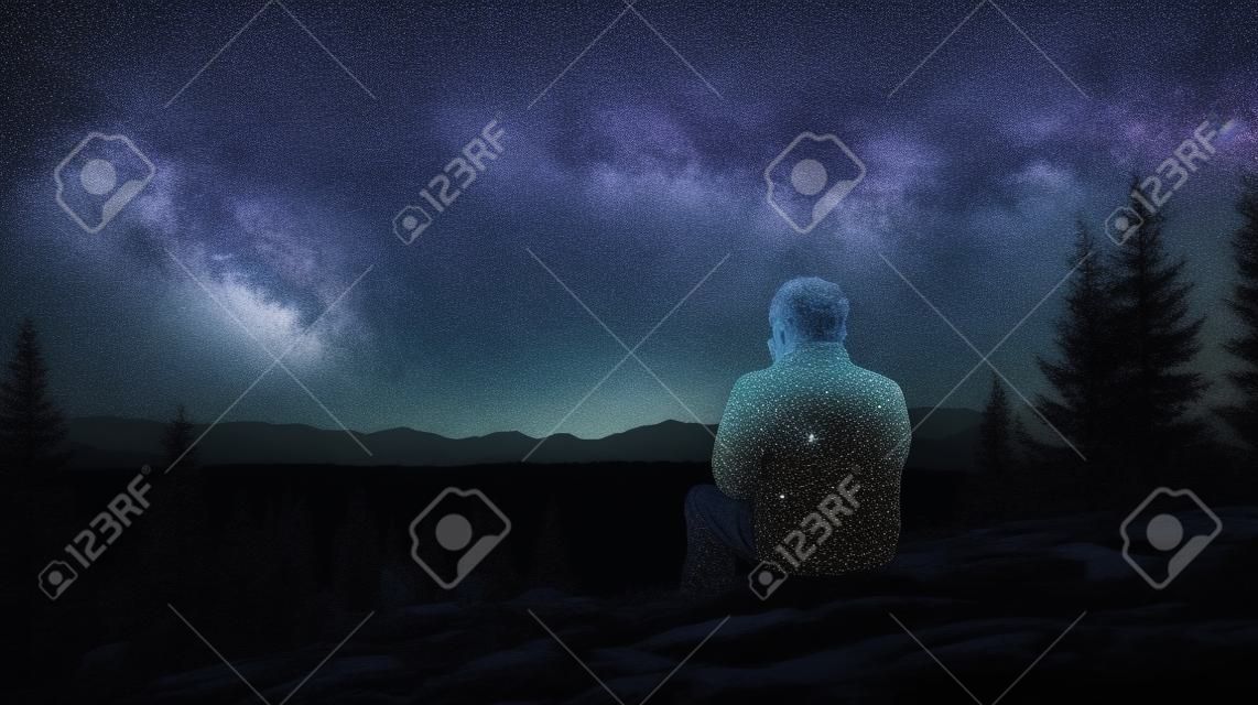 Un hombre sobre una piedra admirando el cielo estrellado generativo ai.