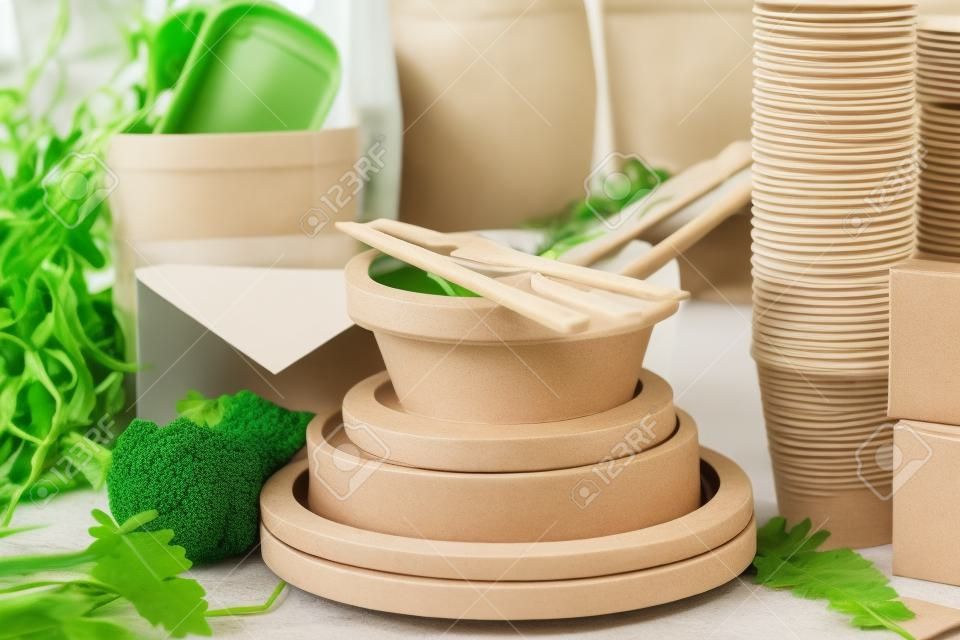 Eco friendly packaging and dishes made from natural recyclable materials. Environmental protection and waste reduction concept