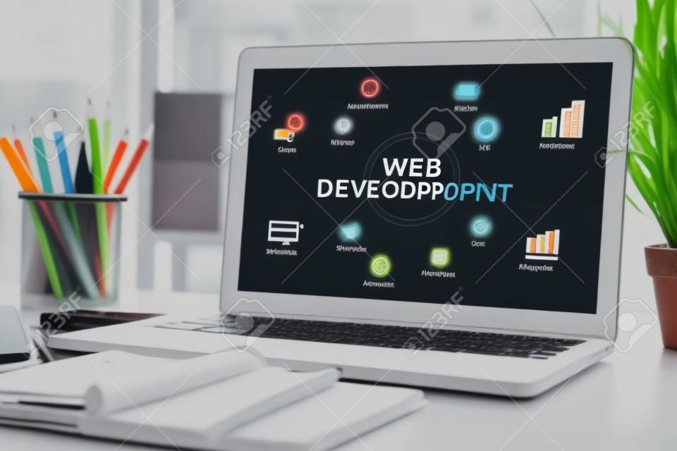 WEB DEVELOPMENT chart with keywords and icons on screen