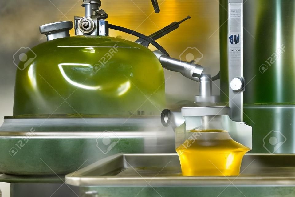 Fresh virgin olive oil production at a cold-press factory after the olive harvesting, Crete, Greece.