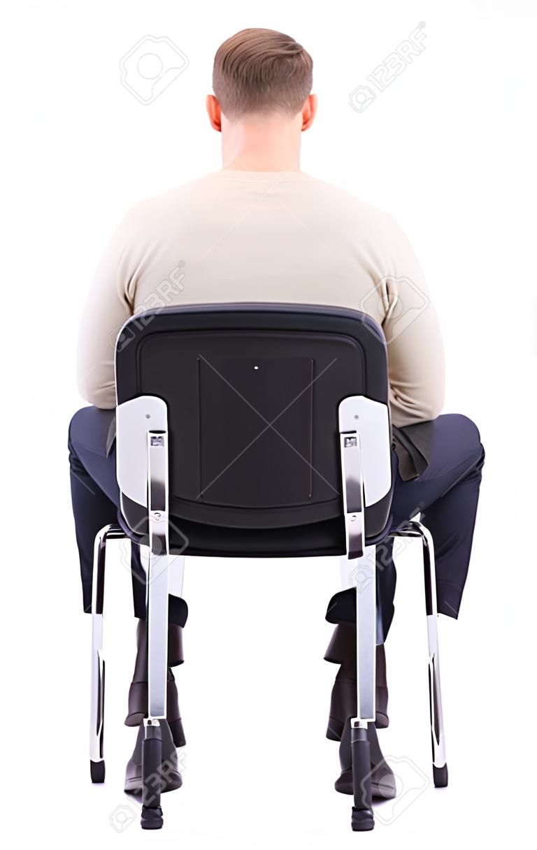 의자에 앉아 비즈니스 남자의 다시보기. 사업가보고. 후면보기 사람 컬렉션입니다. 사람의보기를 후면. 흰색 배경에 고립. 흰색 따뜻한 스웨터에 수염을 기른 ​​남자가 의자에 앉아있다.