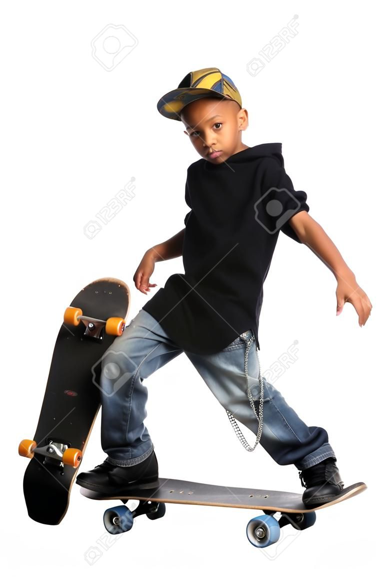 Young African American skateboarder isolated over white background
