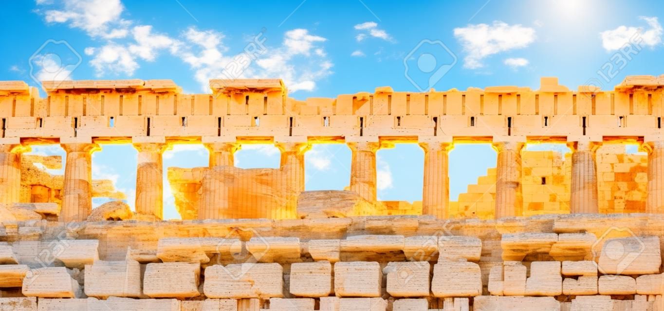 Athens Acropolis, Greece top landmark. Upper part of Parthenon temple, facade side view ancient ruins, blue sky background in spring sunny day.
