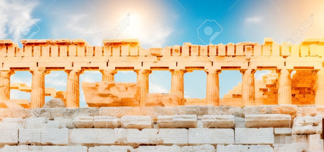 Athens Acropolis, Greece top landmark. Upper part of Parthenon temple, facade side view ancient ruins, blue sky background in spring sunny day.