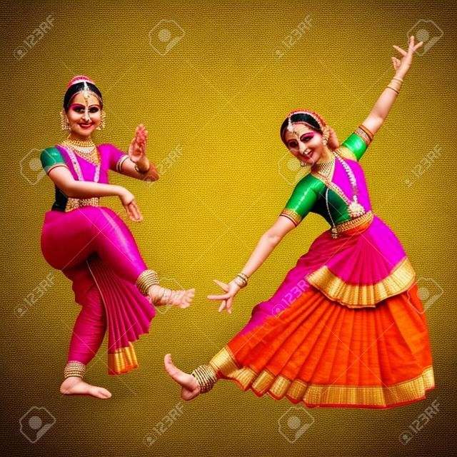 Woman dancer in national indian cloth dancing Bharatanatyam folk dance.