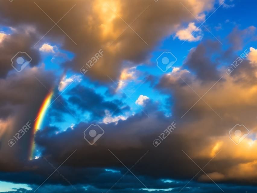 beautiful double rainbow cloudy blue sky