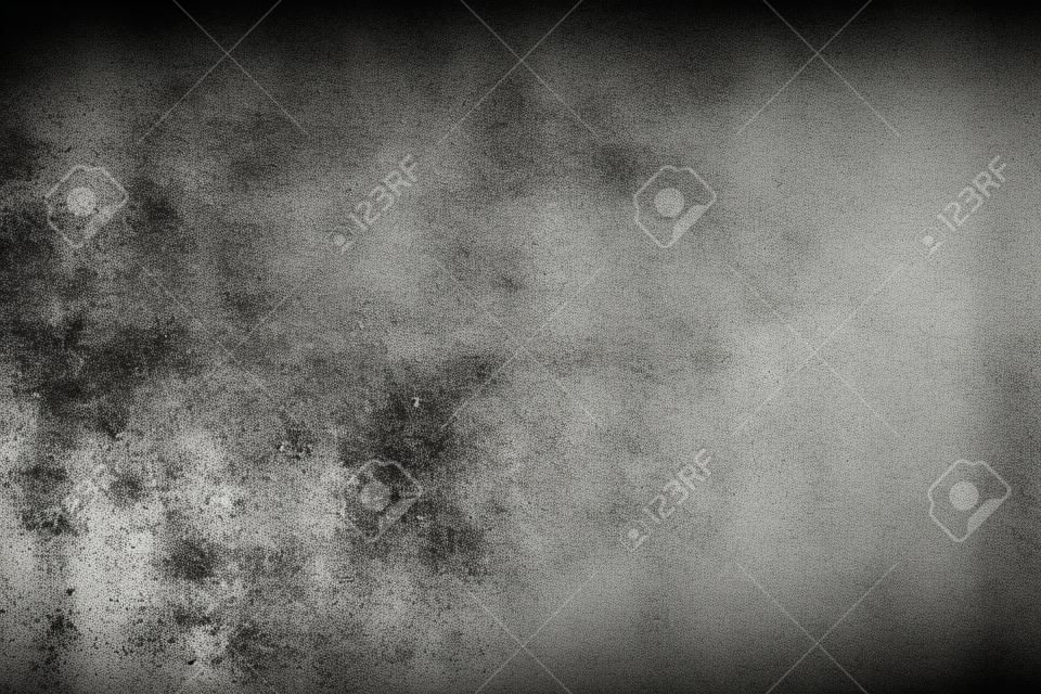 Grunge distressed abstract background. White dust and scratches over black surface. Empty space.