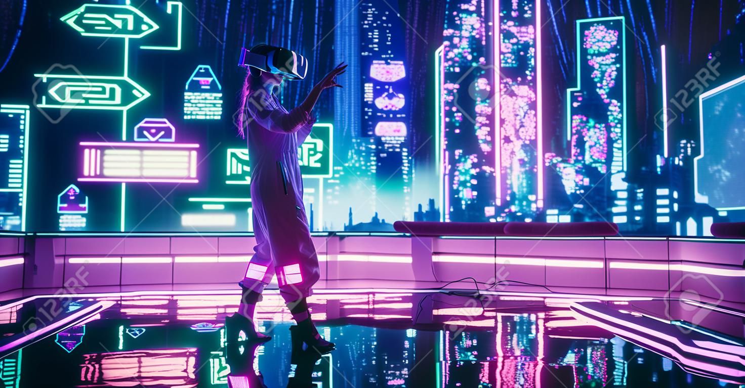 Extravagant Gamer Girl Wearing a Virtual Reality Headset and Using Gestures in a Futuristic Neon Room with Cyberpunk Cityscape. Cosplay Female Exploring VR Metaverse, Playing