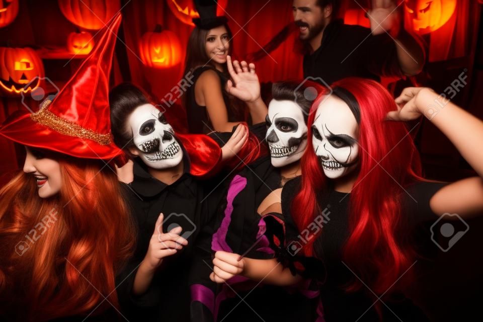Friends dancing at Halloween party