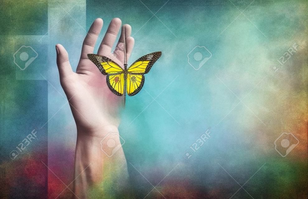 Conceptual graphic of the Christian cross of Jesus with hands setting a reborn butterfly free. Mixed media art symbolic of new spiritual life found in Christ's forgiveness of sin.