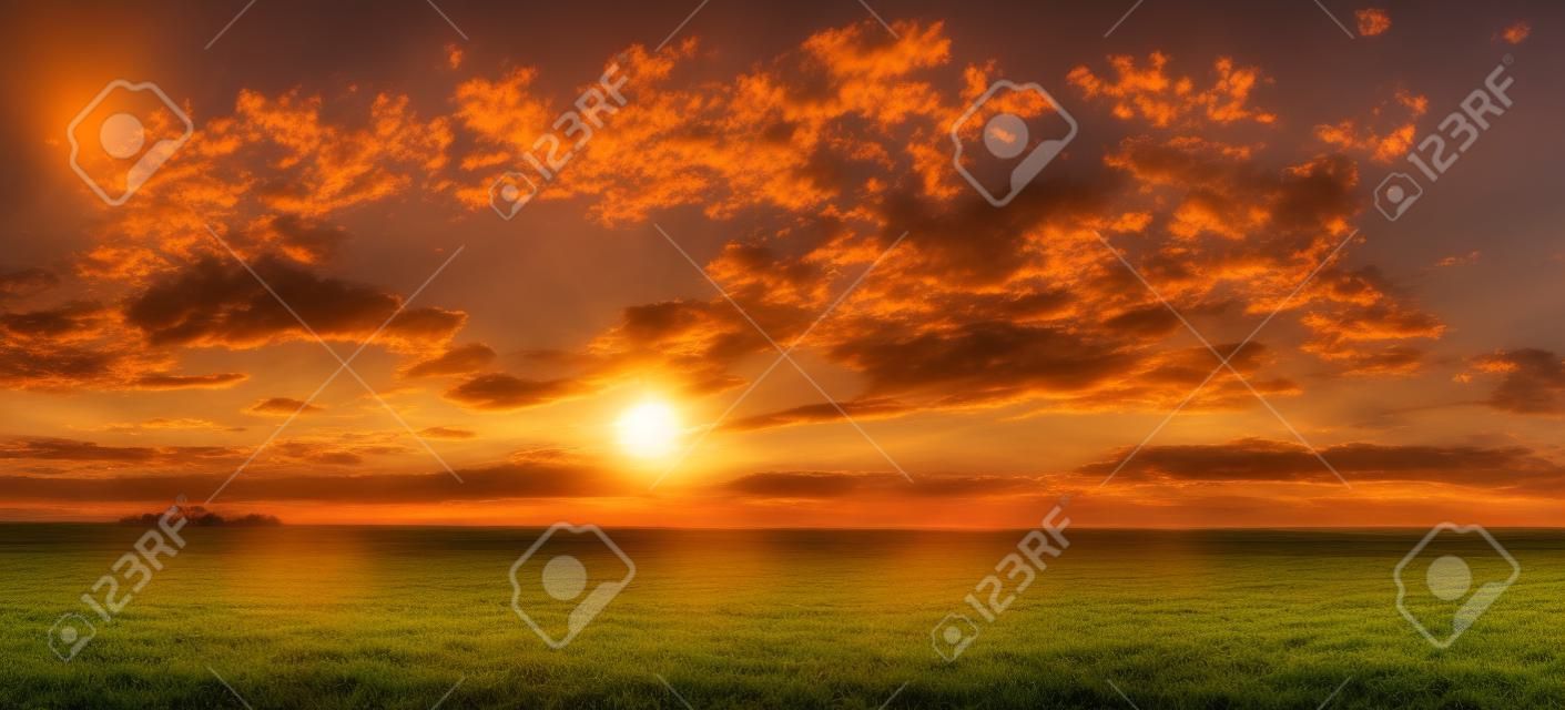 Sunset, Sunrise Over Rural Meadow Field In August Month. Countryside Landscape Under Scenic Summer Dramatic Sky In Sunset Dawn Sunrise. Sun Over Skyline Or Horizon. Panorama, Panoramic View