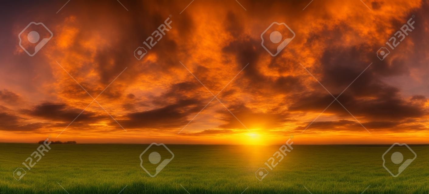 Sunset, Sunrise Over Rural Meadow Field In August Month. Countryside Landscape Under Scenic Summer Dramatic Sky In Sunset Dawn Sunrise. Sun Over Skyline Or Horizon. Panorama, Panoramic View