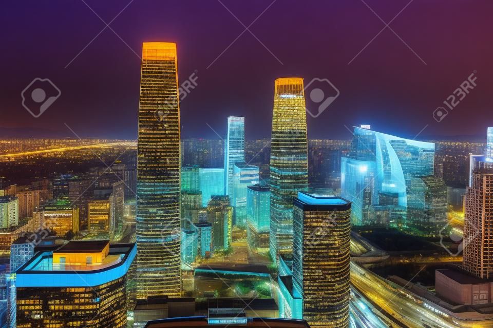 北京、中国の夜景、都市の金融街の高層ビルや高架橋。