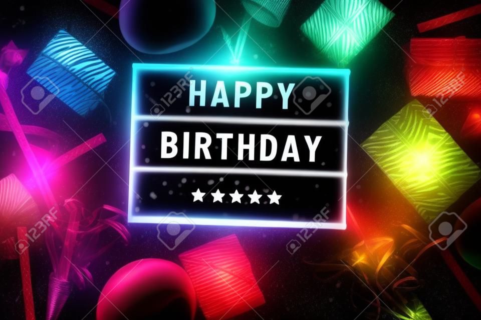 Let's celebrate concepts with happy  birthday text on cinema light box and colorful element prop on dark background.funny activity ideas
