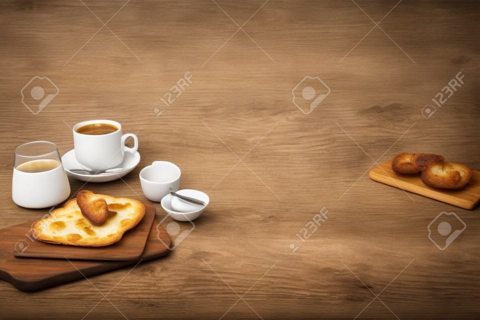 Zestaw śniadaniowego jedzenia lub piekarni i kawy na tle kuchni stołowej. gotowanie i jedzenie ze zdrowym, porannym stylem życia. widok z góry