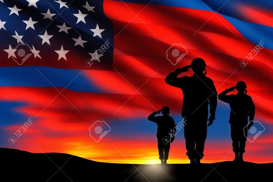 Silhouettes of soldiers saluting on background of sunset or sunrise and USA flag. Greeting card for Veterans Day, Memorial Day, Independence Day. America celebration.