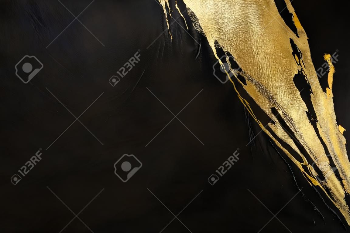 <p>Black and gold background texture</p>