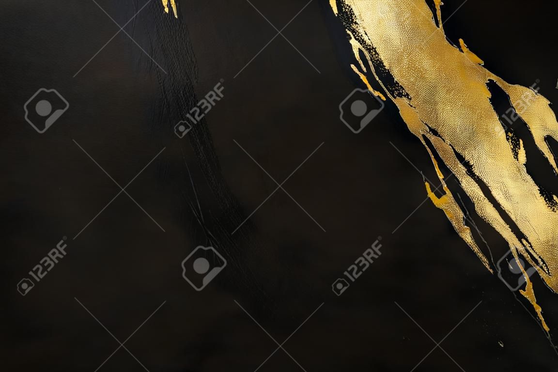 <p>Black and gold background texture</p>