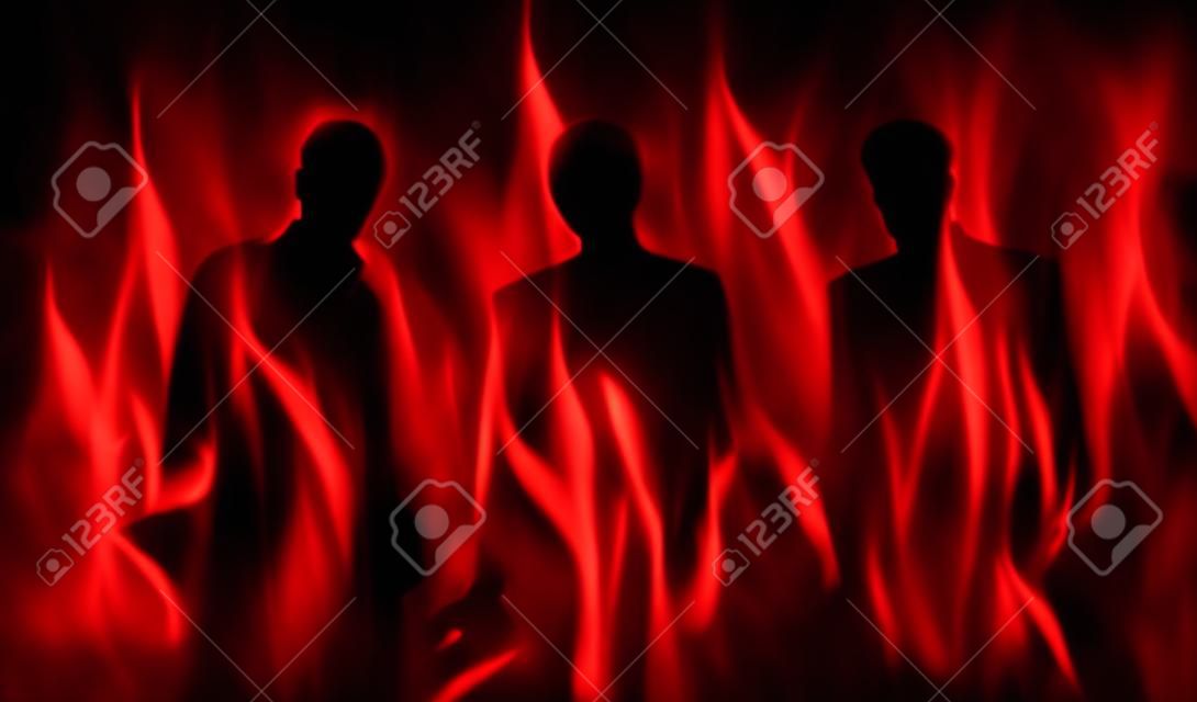 abstrakt beleuchtete Silhouetten von drei Personen in der Hölle