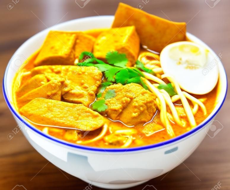 Curry Laksa which is a popular traditional spicy noodle soup from the Peranakan culture in Malaysia and Singapore
