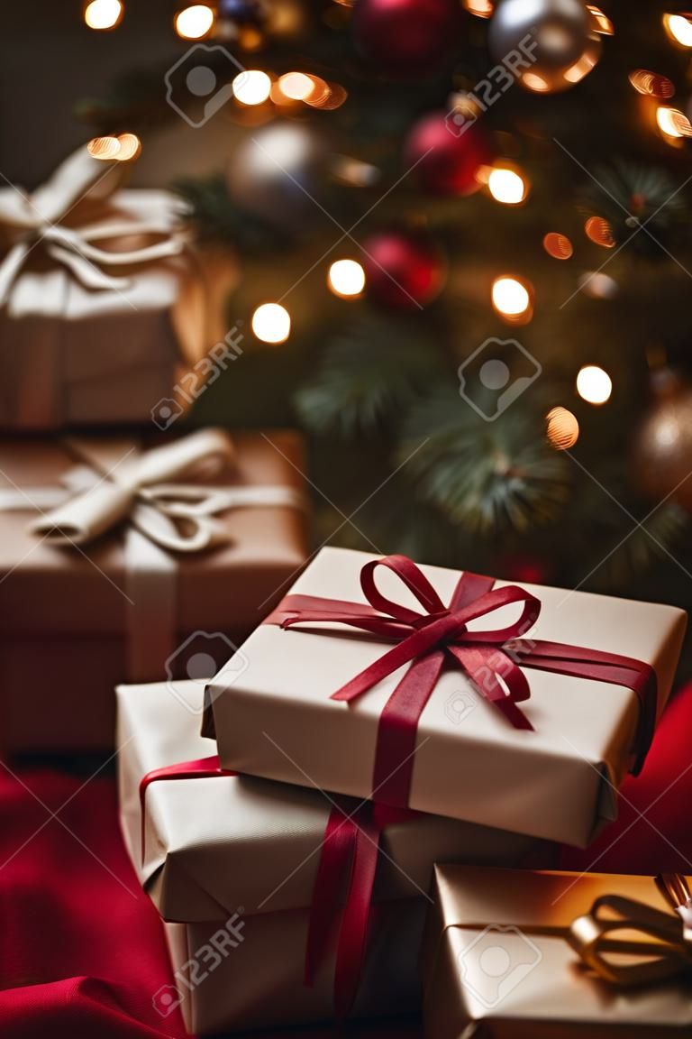 Christmas presents on the background of a Christmas tree. Christmas background.