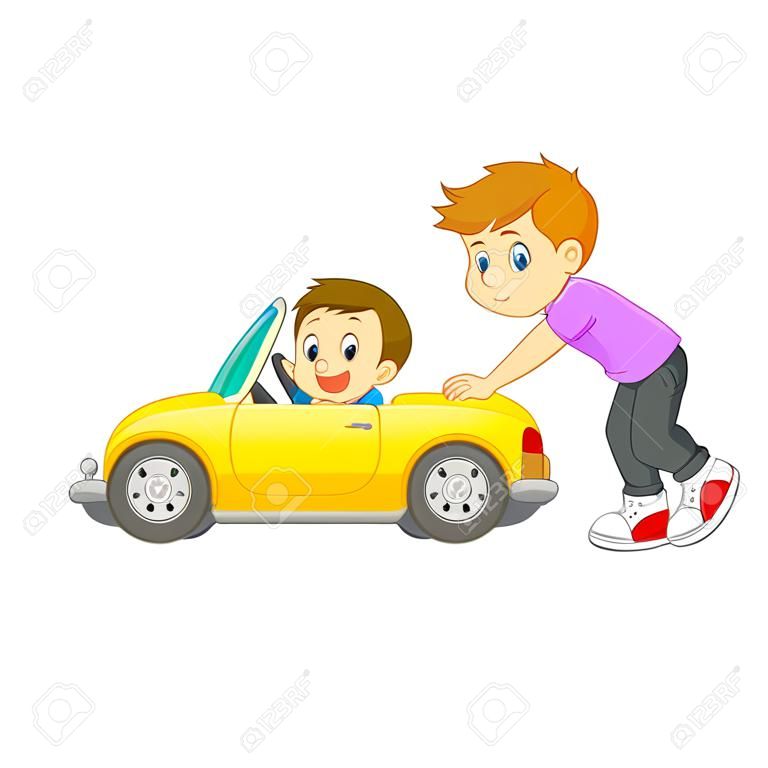 the boy is pushing the yellow car with his friend on it