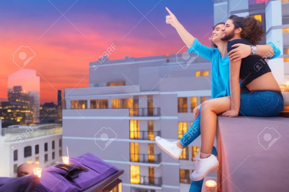 Romantic date on rooftop terrace
