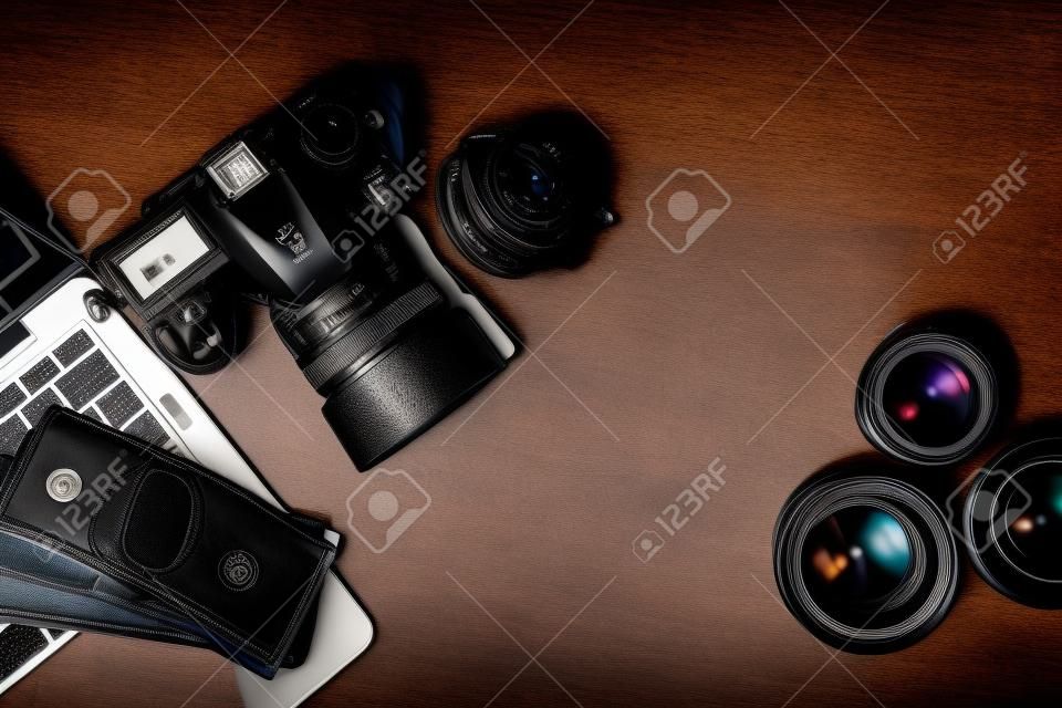 photographers desk on which his instruments and cash are located, top view