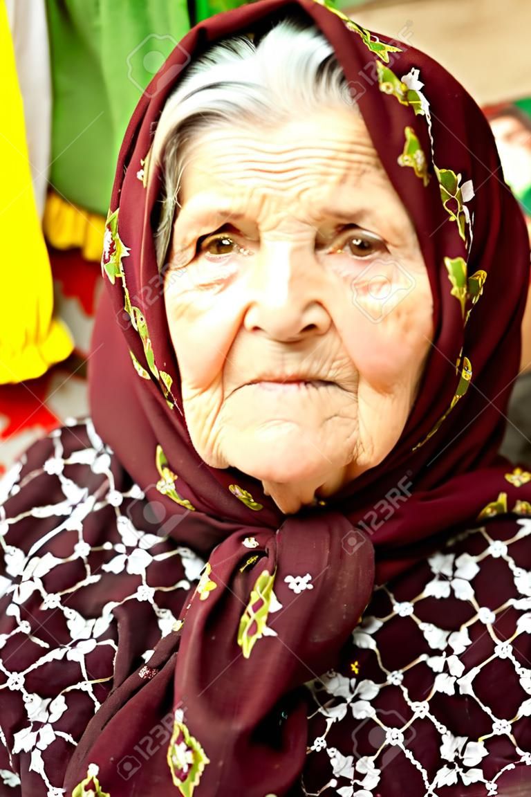 Portrait of an old Romanian woman in her home.