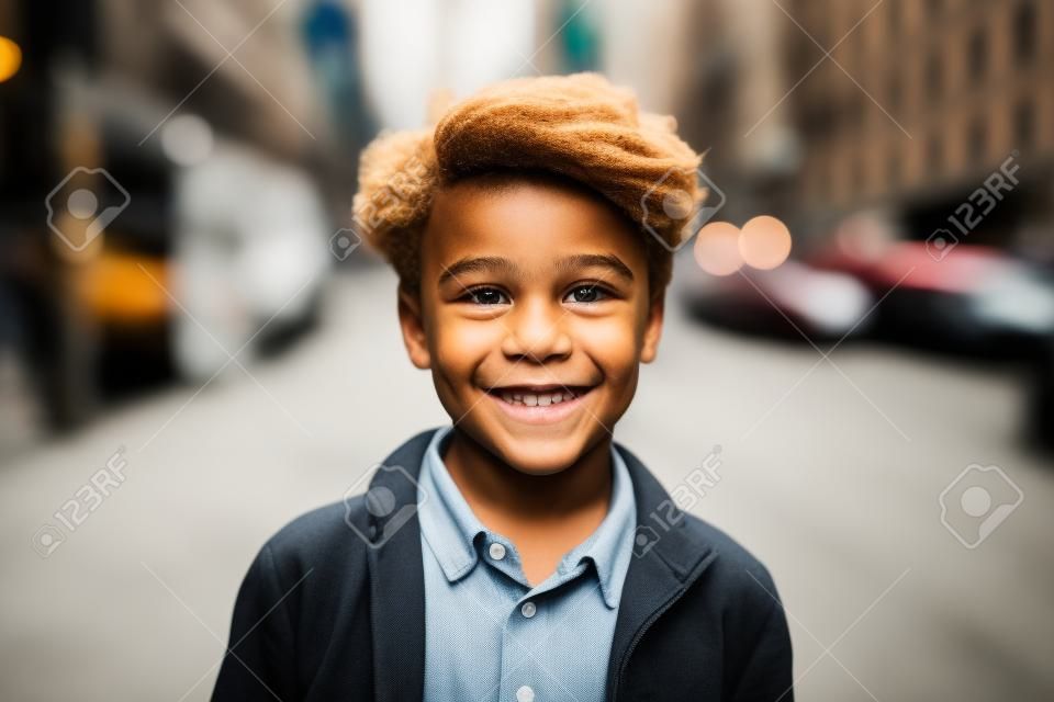 Portrait of a smiling boy on the street in New York City