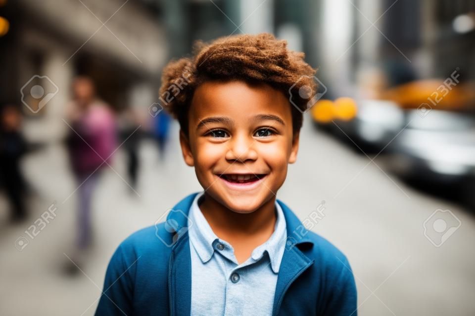 Portrait of a smiling boy on the street in New York City