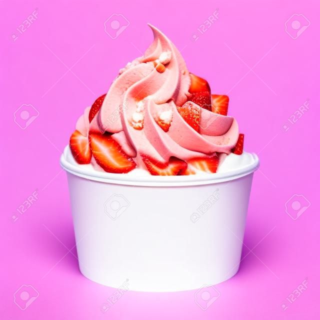 Strawberry frozen yogurt in blank takeaway cup with sauce on white background
