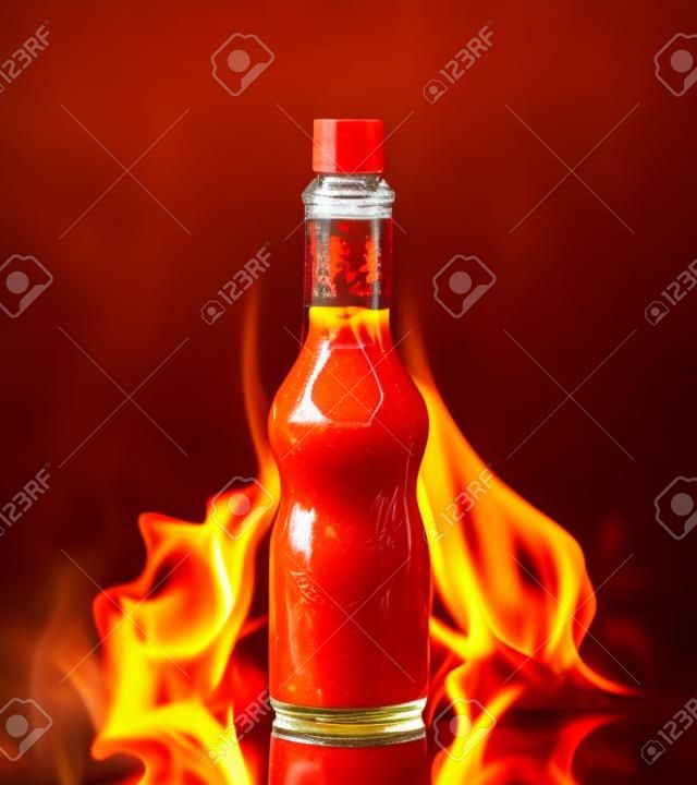 Hot chili sauce in flame