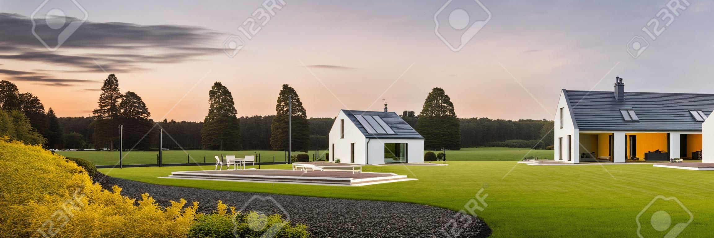 External view of modern and beautiful home with large backyard, panorama