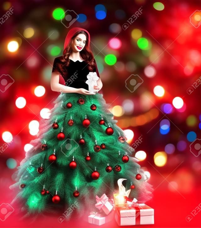 크리스마스 트리 여성 패션 드레스, 모델 소녀와 촛불, 크리스마스 레드 조명 배경에 선물 선물