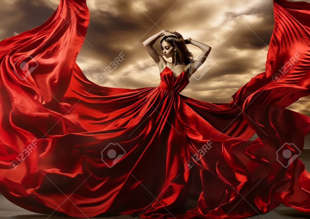Woman Dancing in Red Dress, Fashion Model Dance with Flying Gown Fabric, Silk Cloth Flowing Waving on wind