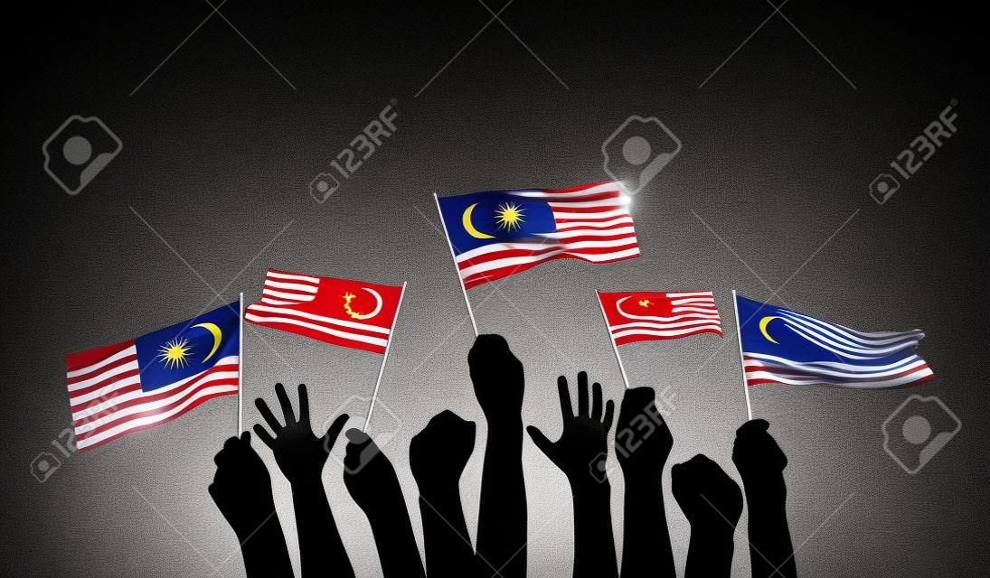 Silhouette di braccia alzate sventolando una bandiera della Malesia con orgoglio. Rendering 3D