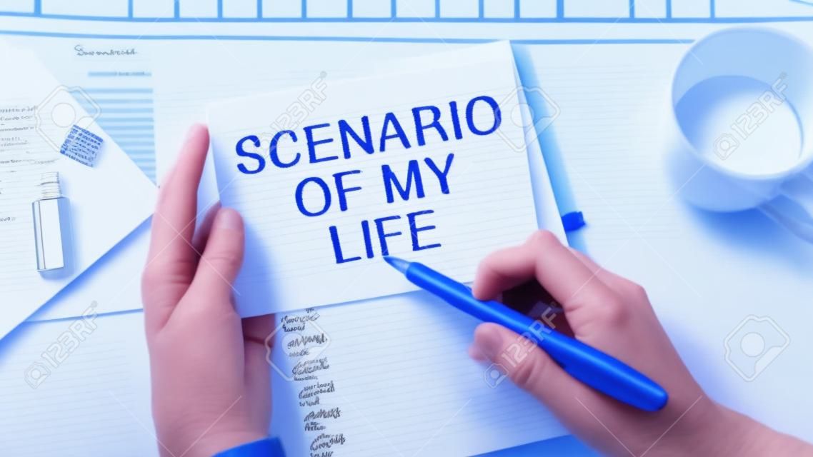 Hand writing 'scenario of my life' on white note, isolated on blue background.