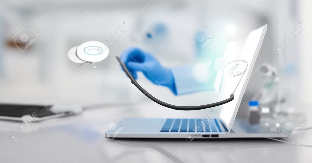 Virtual doctor concept, The doctor's hand with stethoscope protrudes from the laptop screen to examine the patient. Online consultation, Virtual hospital and online therapy.