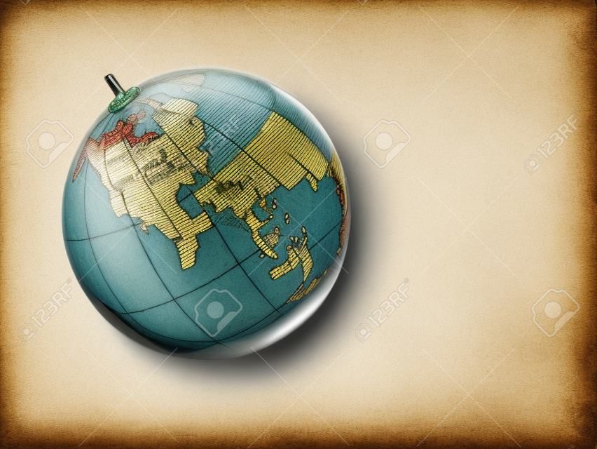 üveggolyó egy képet egy világtérképet vintage papír alapon