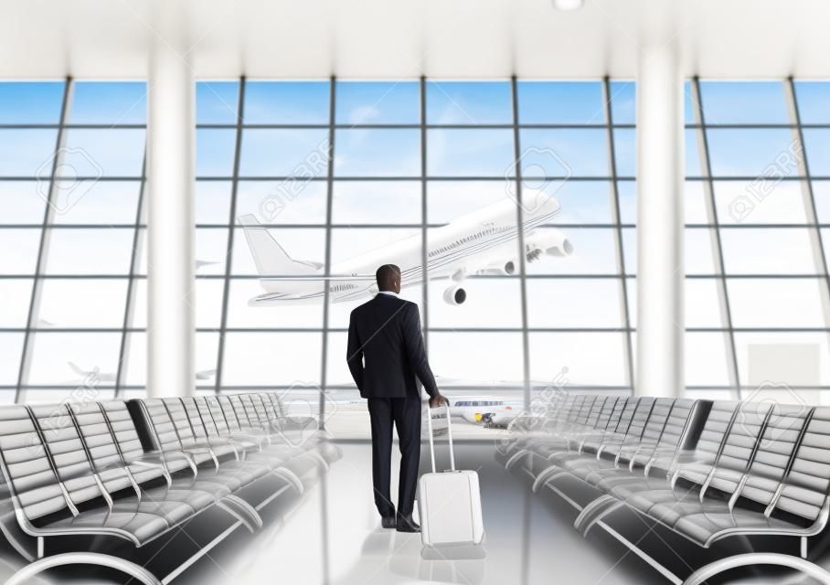 흑인 사업가 파노라마 대기 창을 통해 지상 떨어져 오는 큰 제트를보고 공항 대기 영역. 비즈니스 여행의 개념입니다. 톤 이미지